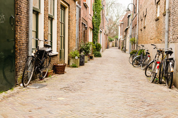 Bicycles parked on a quaint Dutch street in The Netherlands.