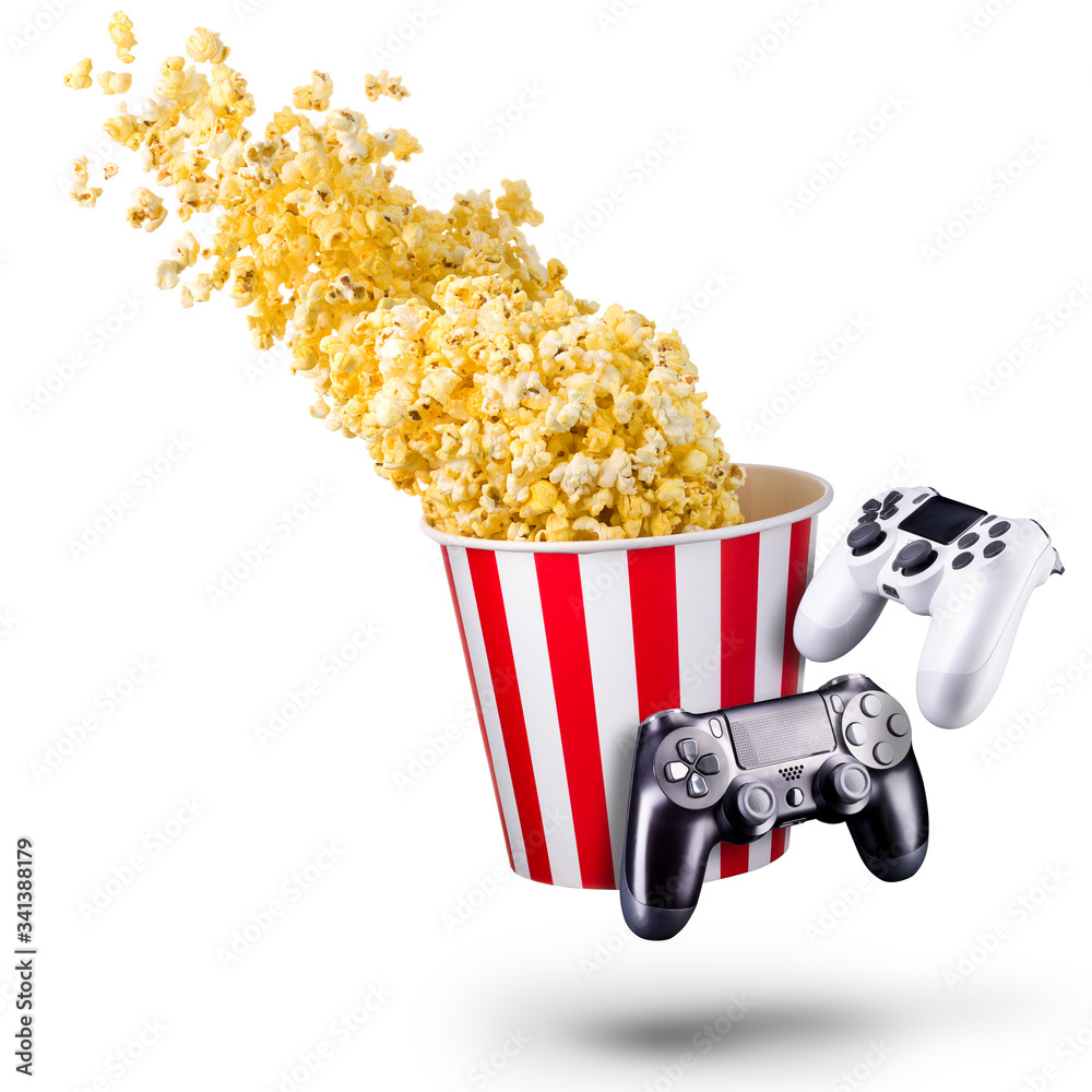 Wall mural Flying popcorn and video game joystick gamepad isolated on a white background