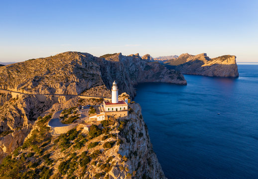 Spain, Mallorca, Aerial view of Formentor Lighthouse at dawn