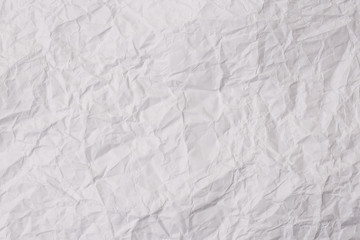 Paper crumple with the texture of the surface,White creased paper texture for abstract background..