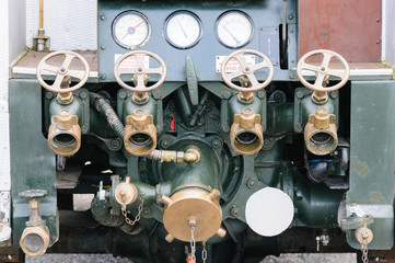 Water hose valves on the back of a 