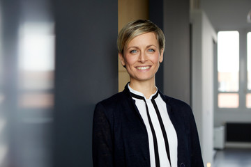 Portrait of smiling businesswoman in office