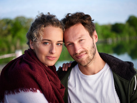 Portrait of romatic couple at lake