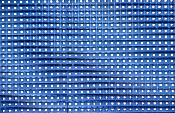 a texture of  orizontal and vertical lines like small windows in blue color 