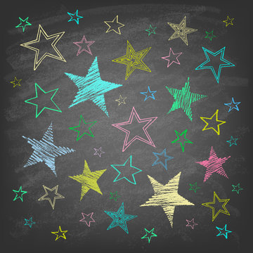 Set of hand drawn stars on chalkboard background. Vector illustration.