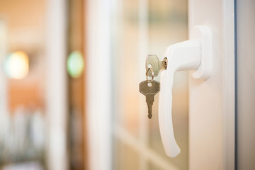 Secure window handle with key in closeup