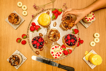 overhead shot of cupcakes with fruits