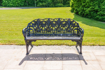 Iron bench in a formal garden