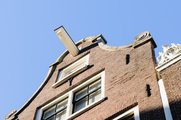 Hook on the roof of a house in Amsterdam, to allow owners to winch furniture and large objects into upper floors