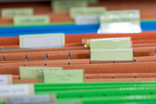 Close up of file folders with personal finance documents