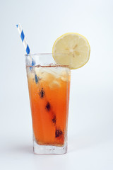 Ice lemon tea with ice cube yellow lemon slice blue white paper straw on white background