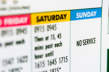 Closeup of a bus timetable showing no Sunday service
