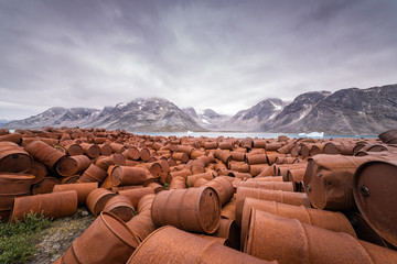 Thousands upon thousands of oil drums litter the beauty of Greenland.  © Max