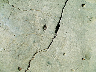 
Crack in the wall of the building. Blurred defocused background for web design.