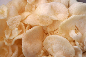 Kerupuk Udang or Prawn crackers are made from tapioca flour and finely ground shrimp mixed with herbs and flavor enhancers.    