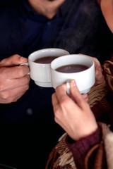 
drink tea from white cups with a blanket