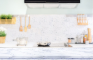 White marble texture  table top on blurred kitchen background