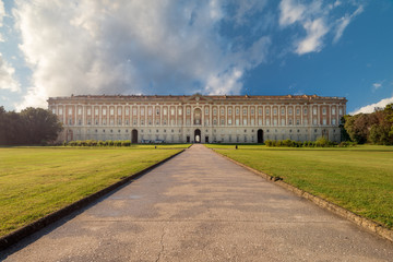 The Royal Palace in Caserta (Reggia di Caserta) Italy. Entrance of the The Royal Palace of Caserta, built in 18th century and former residence of Bourbon kings. Caserta, Italy, October 2018. - obrazy, fototapety, plakaty