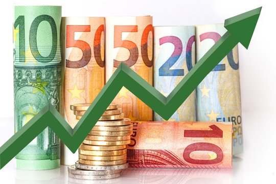 euro banknotes standing and green arrow going up