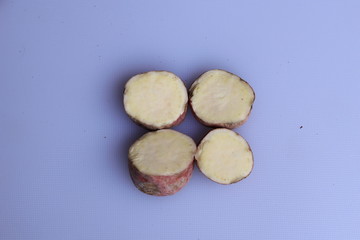 Fresh sweet potatoes isolated on white background