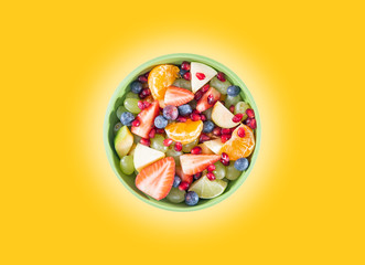 Portion fruit salad in a bowl . Healthy meal
