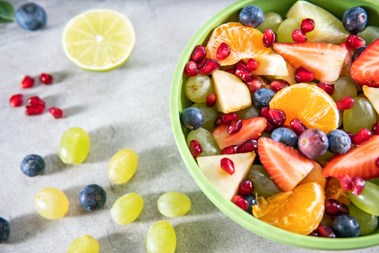 Portion fruit salad in a bowl . Healthy meal