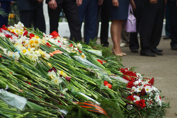 Laying flowers on the 9th of May for veterans