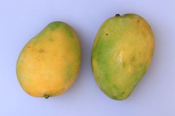 Fresh Yellow Mango fruit slice isolated on white background

