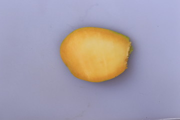 Fresh Yellow Mango fruit slice isolated on white background

