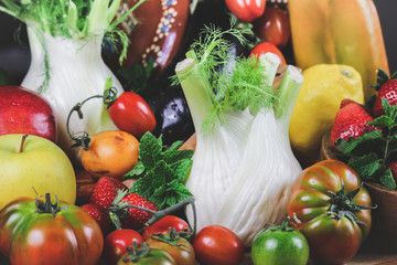 closeup of a rustic composition of fruit and vegetables