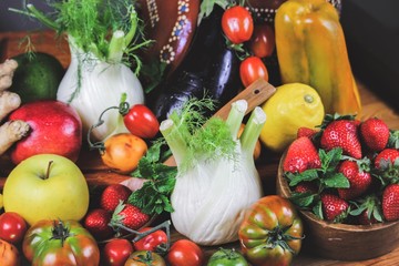 closeup of a rustic composition of fruit and vegetables