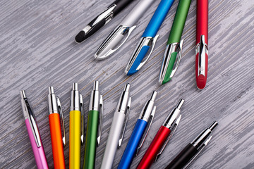 Fototapeta premium Moscow, Russia - 01/22/2020: Ball and pen handles are multicolored, with different furniture and color range
