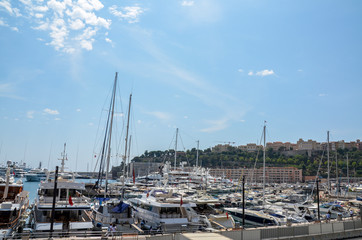 Luxury yachts and different boats docked at the pier at Port Hercules is the only deep-water port in Monaco. Travel and tourism concept