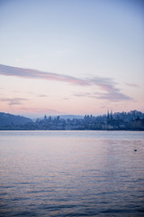 Lucerne city in a veil of pink sunset