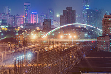 Cityscape and railway station at evening time. Shenzhen. China.