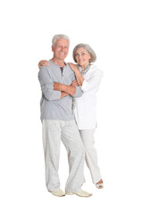 portrait of senior couple hugging isolated