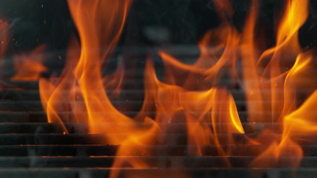 Super slow motion of flames with empty grill grid. Filmed on high speed cinema camera, 1000 fps
