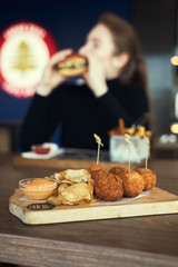 Fried Mac and Cheese balls served with ketch up, selective focus
- 341419756