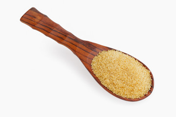 Sugar in wooden spoon isolated on white background.This has clipping path.  