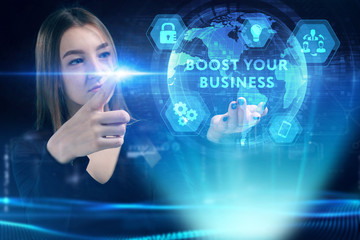 Business, Technology, Internet and network concept. Young businessman working on a virtual screen of the future and sees the inscription: Boost your business