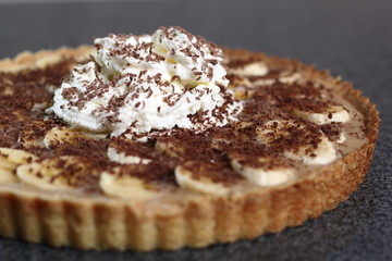 Boston Banoffee Pie. Biscuity Shortcrust Pastry with Caramel Fudge Filling and Banana Topping.