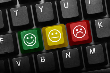 Three keys conceptual keyboard - Positive, Neutral and Negative smiley keys