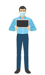 Man in medical mask with digital tablet. Full length portrait of man in a flat style.