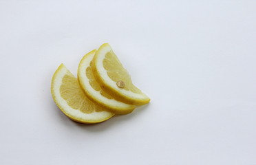 sliced lemon on a white background