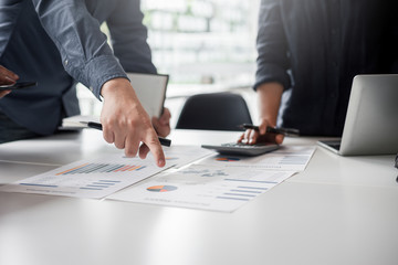 Teamwork of business people Financial data graph analysis On the table in the meeting room.