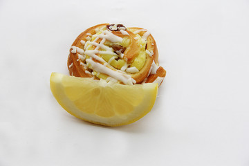 cake with lemon filling and a juicy slice of lemon