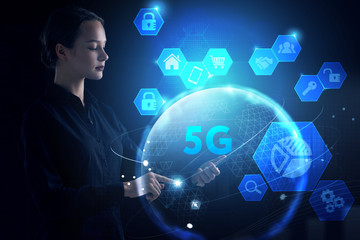 Business, Technology, Internet and network concept. Young businessman working on a virtual screen of the future and sees the inscription: 5G
