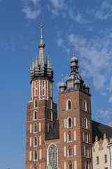 Beautiful Basilica of St. Mary's (XIII century) in historical center of Krakow - Market Square (Rynek Glowny). Krakow, Poland.