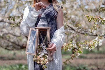 girl with a lantern and flowers