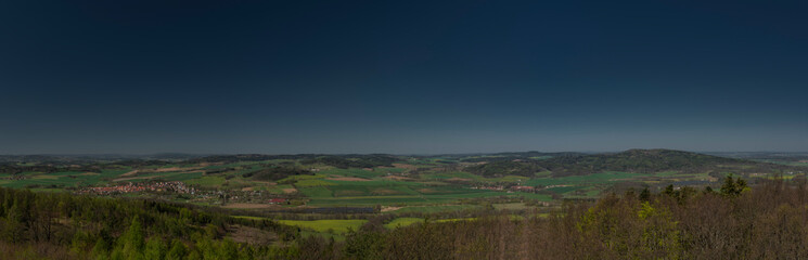 Fototapeta premium View from Svobodna hill in spring day with fields and meadows